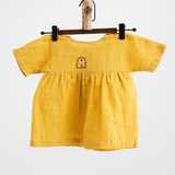 Zoey baby dress Organic Muslin Mustard Glow Dress