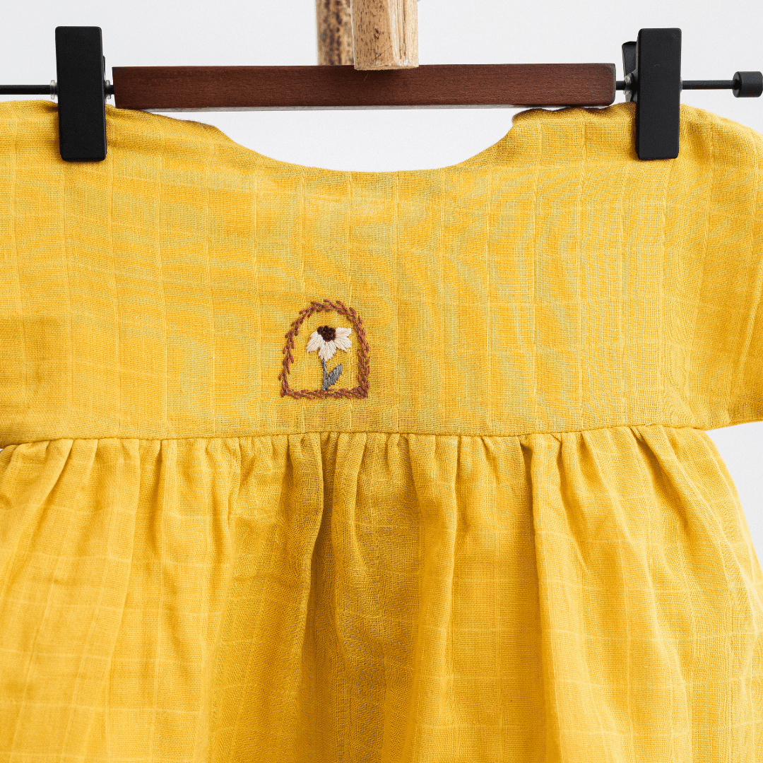 Zoey baby dress Organic Muslin Mustard Glow Dress