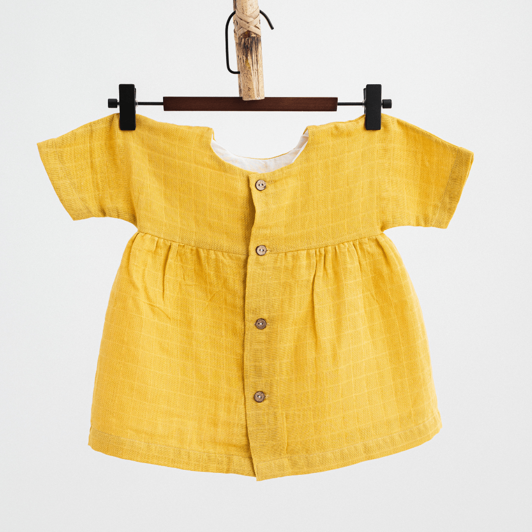 Zoey baby dress Organic Muslin Mustard Glow Dress