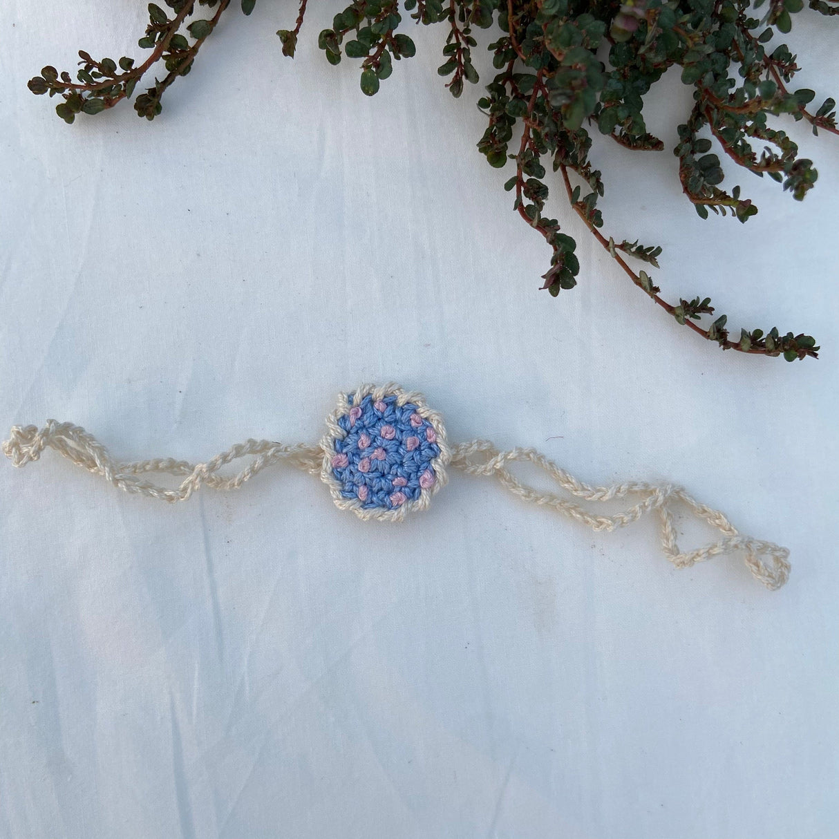 Zoey Rakhi Happiness Blooms Crochet Rakhi (First Rakshabandhan)