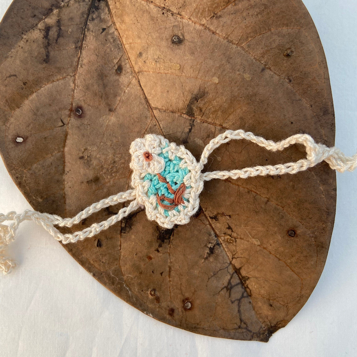 Zoey Rakhi Oopsy Daisy Crochet Rakhi (First Rakshabandhan)