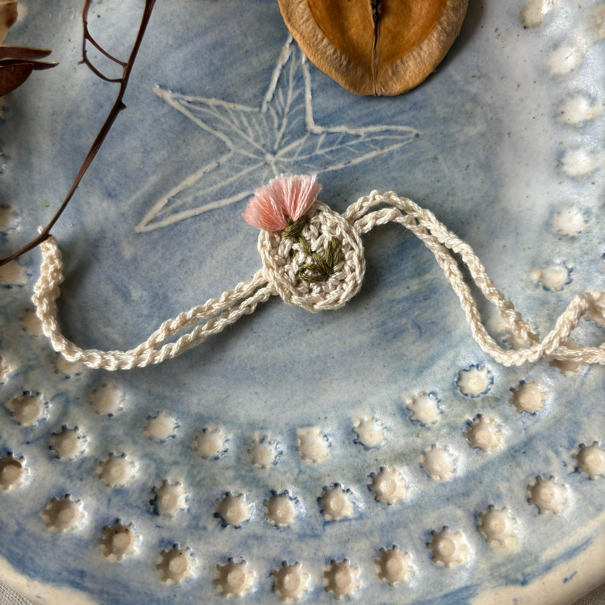 Zoey Rakhi With Embroidered Pouch Buddy Tulip Crochet Rakhi (First Rakshabandhan)